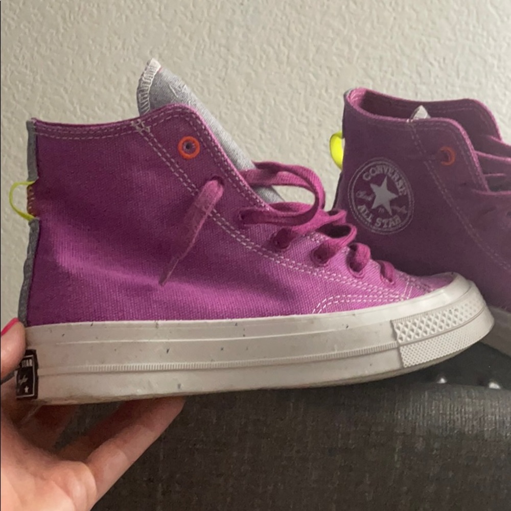 Purple converse high tops